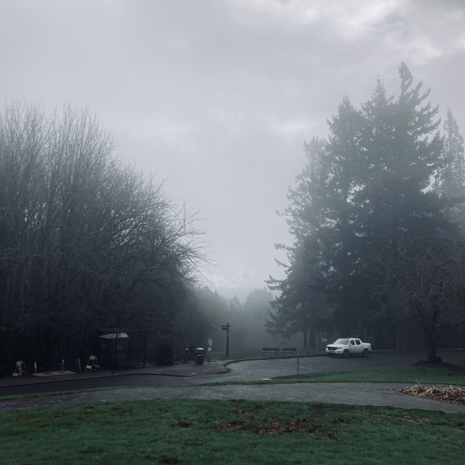 A cloud hanging over the top of council crest obscures the distant (and near) view